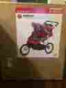 13-sc215 Schwinn Double Jogging Stroller Arrow