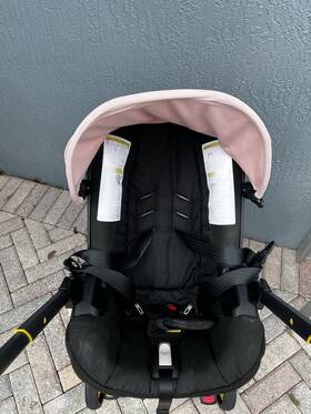 Doona 50263158 Travel System Stroller Pink Black Yellow Adjustable Back Rest Basket