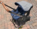 Doona Car Seat Stroller Navy Stripe Folding Adjustable Handle Yellow Wheels. Fixed Price $631.99.