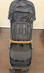 Nuna Trvl Stroller Caviar/black. Fixed Price $350.00.