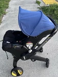Doona Baby Car Seat & Stroller - Blue Hood Cover Travel System For Babies. Fixed Price $100.00.