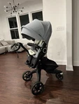 Stokke Xplory Stroller Light Gray Carrycot Adjustable Handles Rubber Tires. Fixed Price $750.00.
