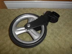 Front Wheel For Peg Perego Vela Stroller. Size 6 5/8" Fits Right Only. Fixed Price $11.99.