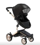 Mima Xari Stroller Includes Footmuff, Rain Cover And Extra Set Of Wheels. Fixed Price $550.00.