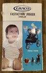 MA6 New Graco Fastaction Jogger Travel System Tropical Fashion Stroller. Fixed Price $140.00.