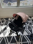 Doona Baby Car Seat & Stroller + Latch Base Travel Bag - Pink (used). Fixed Price $425.00.