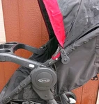 Graco Black & Red Single Stroller Cup Holders, Storage Basket, Folds Easily. Fixed Price $78.05.