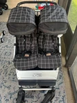 Mountain Buggy Duet - Double Stroller Black And White Checkered. Fixed Price $400.00.