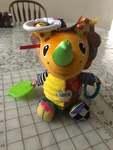 Tomy Lamaze Multi Colored Rino Taggie Plush W Horn Nose 8" Educational Clip. Fixed Price $15.19.