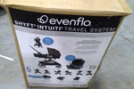 Evenflo Shyft Intuiti Travel System Featuring REVOLVE180 Litemax Nxt Black Shale. Fixed Price $578.00.