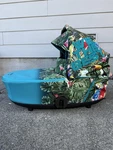 Cybex Mios Blue And Green Carry Cot Baby Bassinet. Fixed Price $280.00.