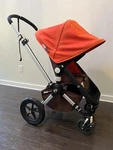 Bugaboo Cameleon Dark Brown/orange Travel System Single Seat Stroller. Fixed Price $450.00.