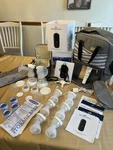 New! Baby Buddha Portable Double Electric Breast Pump With Bag, Bottles. Etc. Fixed Price $279.00.