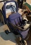 Baby Trend Purple & Black Single Stroller, Five-point Harness, Cup Holder. Fixed Price $15.75.