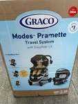 Graco Modes Pramette Travel System W/ Snugride Lx- Brand New. Fixed Price $270.00.