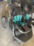 Baby Trend Navigator Double Jogger Stroller - Tropic (DX60402). Fixed Price $125.00.