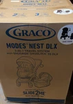 Graco Modes Nest Dlx Travel System - Black. Fixed Price $410.00.